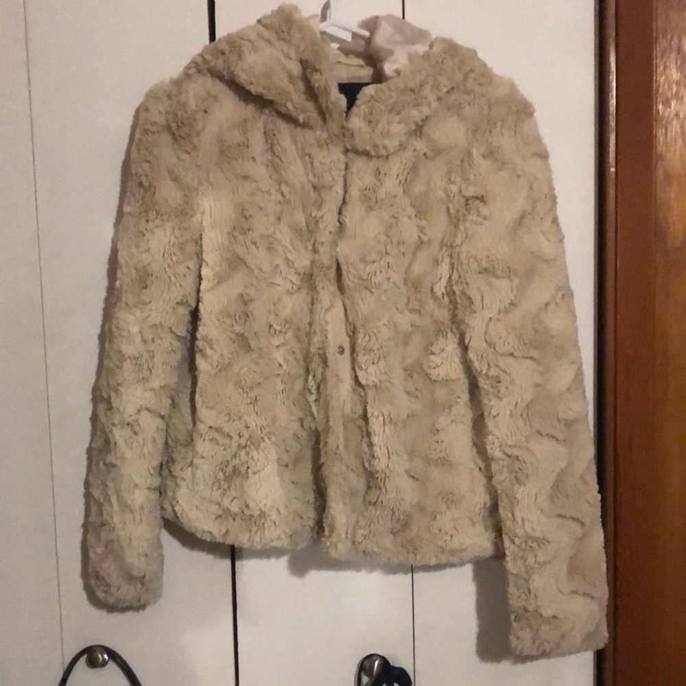 Soft furry jacket with smooth silky fabric in the inside